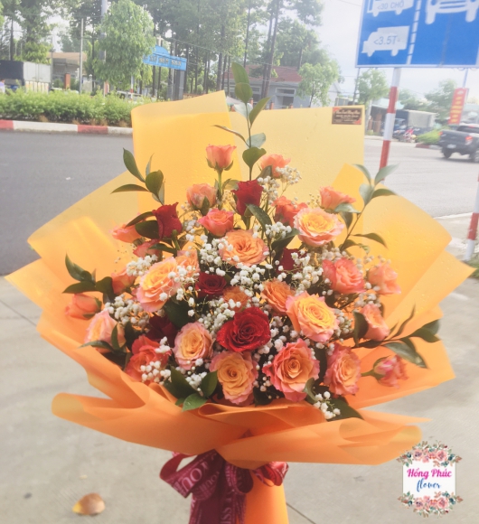 Bó hoa Hồng cam spirit 35 bông sang trọng sành điệu ở Tân Uyên, Bình Dương 